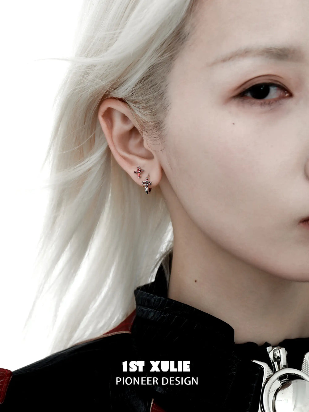 1ST XULIE "Snake Bite" Asymmetrical Cross Stud & Huggie Earrings in Platinum Plated 925 Sterling Silver - Lifestyle Shot