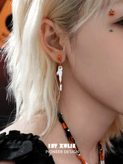 1ST XULIE "CANDLELIGHT GHOST" Asymmetrical Ghost Dangle Earrings in Platinum - Detail Shot