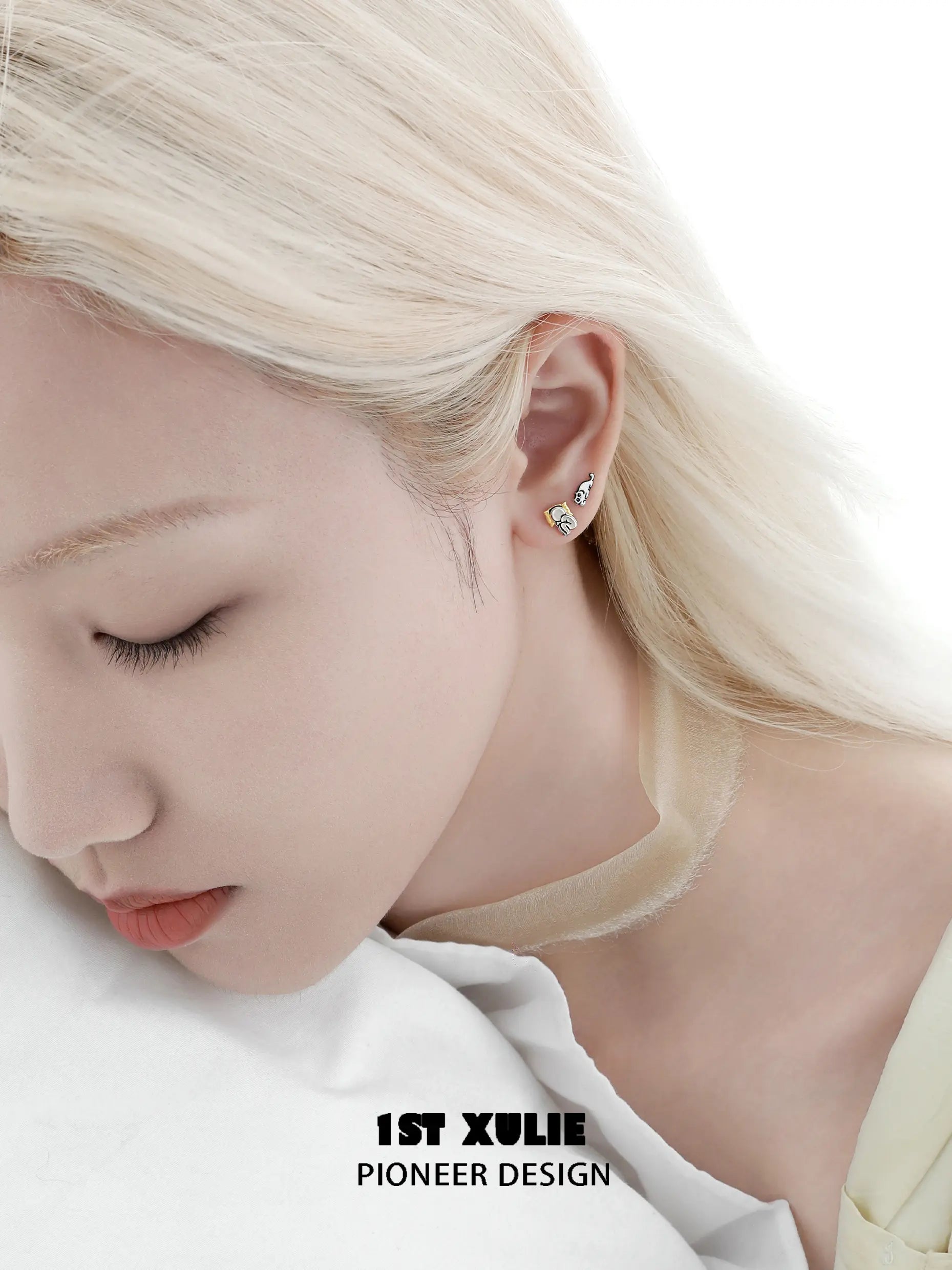 1ST XULIE "Cat's Gaze" Asymmetrical Human and Cat Stud Earrings in 925 Sterling Silver - On Model 1ST XULIE "Cat's Gaze" Asymmetrical Human and Cat Stud Earrings in 925 Sterling Silver - On Model
