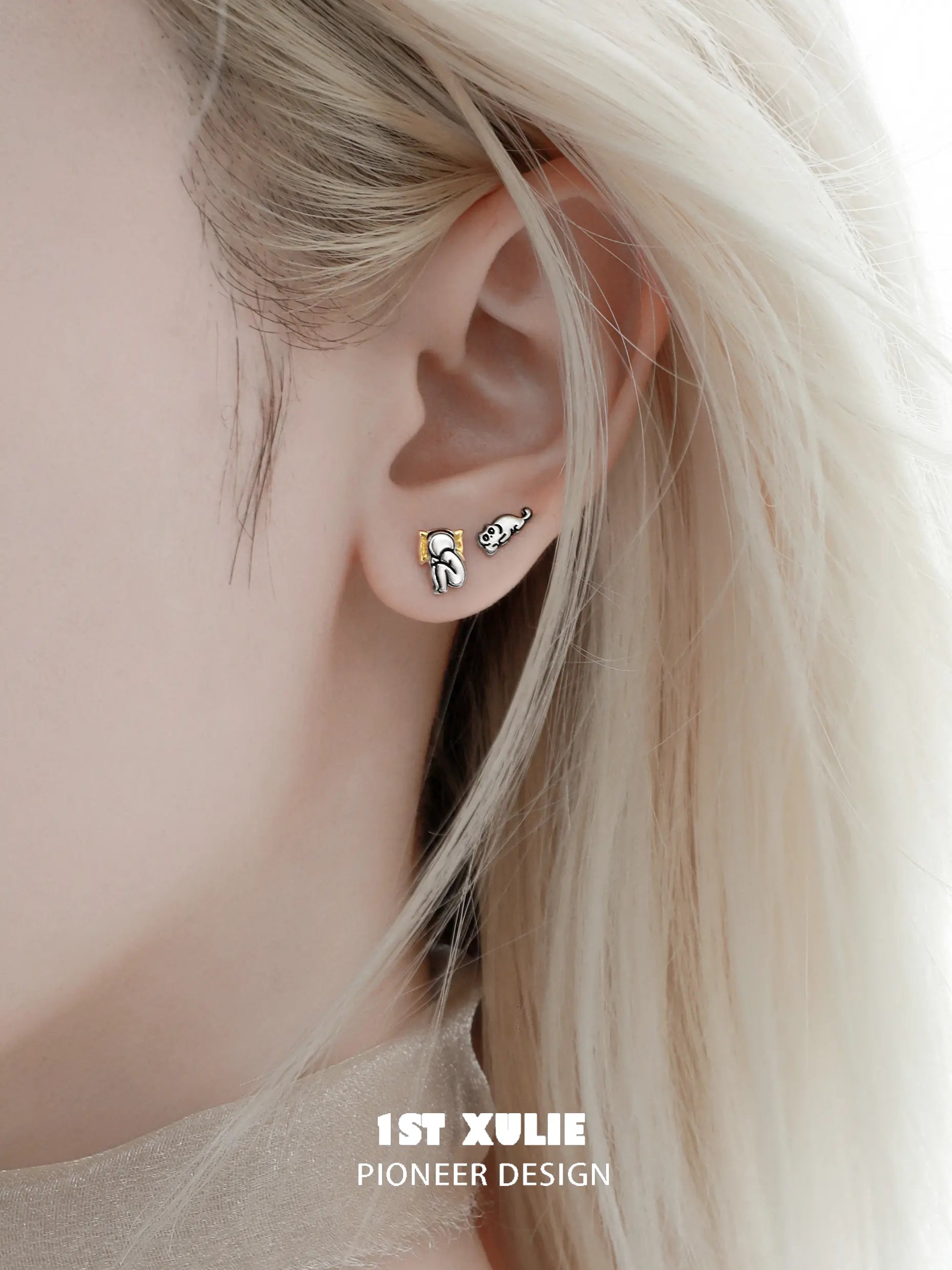 1ST XULIE "Cat's Gaze" Asymmetrical Human and Cat Stud Earrings in 925 Sterling Silver - On Model Close-Up 1ST XULIE "Cat's Gaze" Asymmetrical Human and Cat Stud Earrings in 925 Sterling Silver - On Model Close-Up