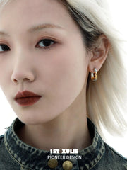 1ST XULIE "Lucifer" Statement Black Swan Wing Hoop Earrings in Platinum Plated Brass - Texture Detail