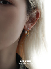 1ST XULIE "Lucifer" Statement Black Swan Wing Hoop Earrings in Platinum Plated Brass - On Model Close-Up