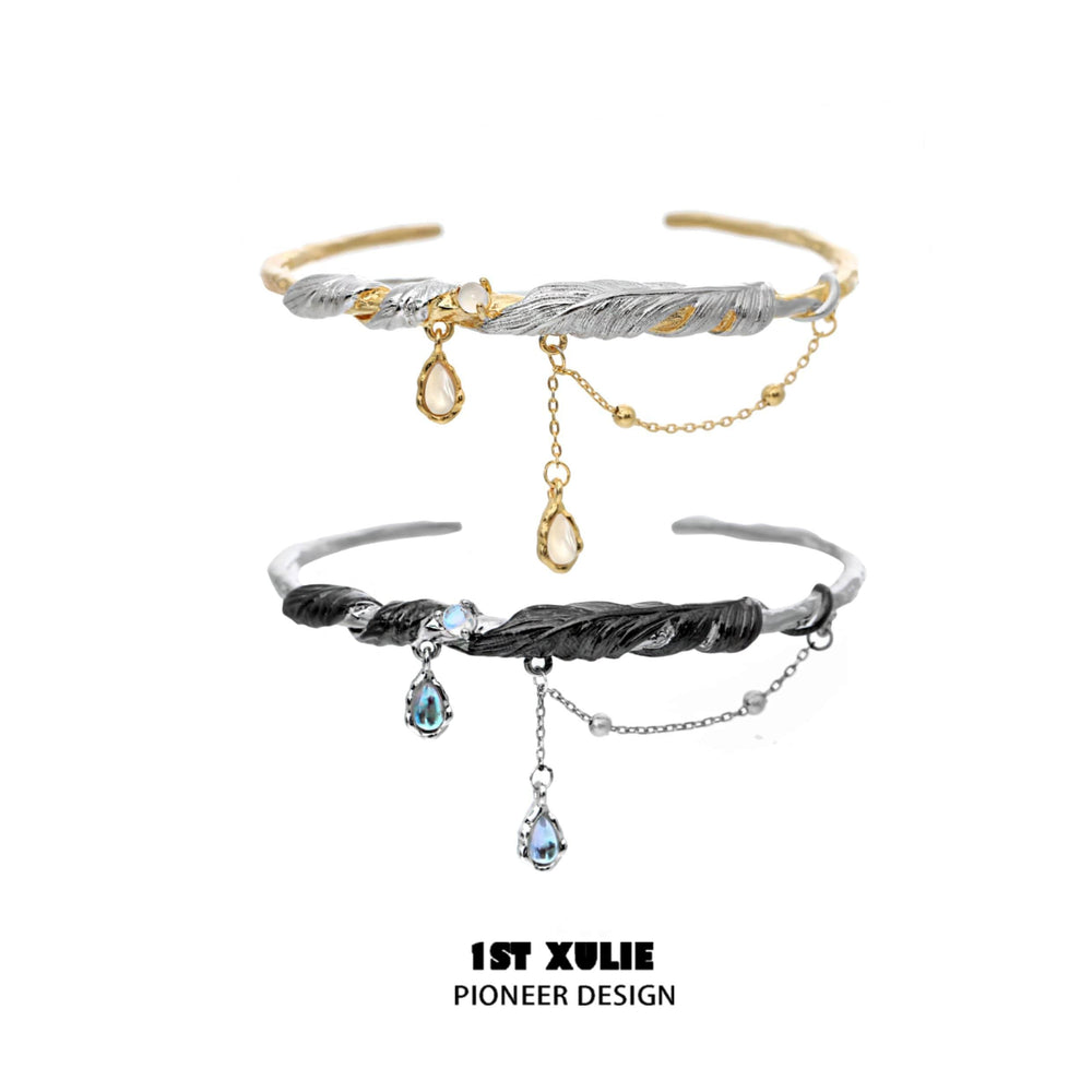 1ST XULIE "Lucifer" Platinum Plated Black Swan Wing Statement Cuff Bangle in Platinum Plated - Angle View