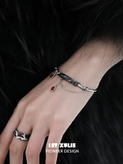 1ST XULIE "Lucifer" Platinum Plated Black Swan Wing Statement Cuff Bangle in Platinum Plated - Lifestyle Shot