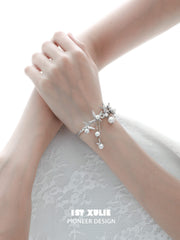 1ST XULIE "Whiterfly" Butterfly Pearl Tassel Cuff Bracelet in Platinum Plated Brass - Lifestyle Shot