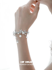 1ST XULIE "Whiterfly" Butterfly Pearl Tassel Cuff Bracelet in Platinum Plated Brass - On Model Close-up