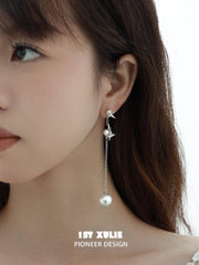 1ST XULIE "Whiterfly" Sculptural Butterfly Wing Pearl Stud Earrings in Platinum Plated Silver - Angled Product View