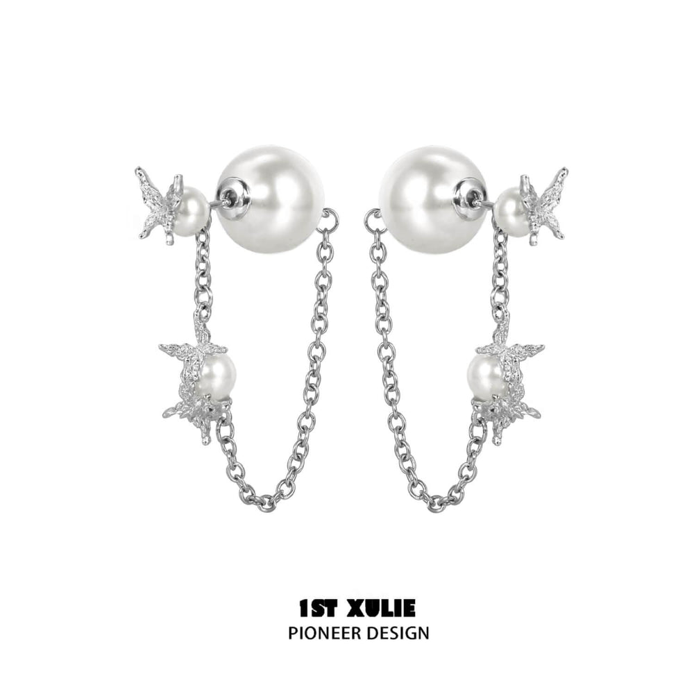 1ST XULIE "Whiterfly" Sculptural Butterfly Wing Pearl Stud Earrings in Platinum Plated Silver - Lifestyle Shot