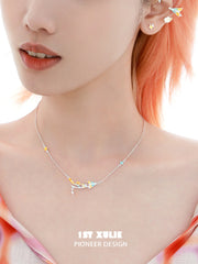 1ST XULIE "Juicy Flight" Dainty Celestial Paper Airplane & Star Pendant Necklace in 925 Sterling Silver - On Model