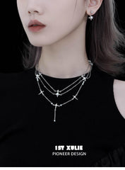 1ST XULIE "Star Trails" Celestial Shell Bead Stud Earrings in Platinum Plated 925 Sterling Silver - Angled View