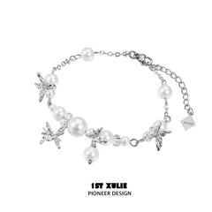 1ST XULIE "Whiterfly" Dainty Butterfly Pearl Charm Bracelet in Platinum Plated Brass - Detail Shot