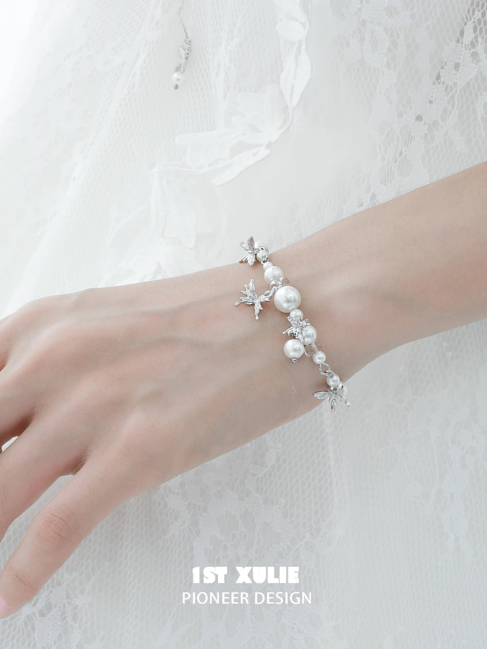 1ST XULIE "Whiterfly" Dainty Butterfly Pearl Charm Bracelet in Platinum Plated Brass - Product View