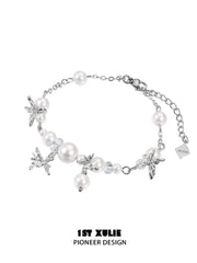 1ST XULIE "Whiterfly" Dainty Butterfly Pearl Charm Bracelet in Platinum Plated Brass - On Model