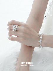 1ST XULIE "Whiterfly" Dainty Butterfly Pearl Charm Bracelet in Platinum Plated Brass - On Model Close-up