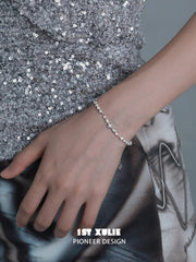 1ST XULIE "Silver Angel" Dainty Minimalist Disc Charm Chain Bracelet in 925 Sterling Silver - Close-up on Model
