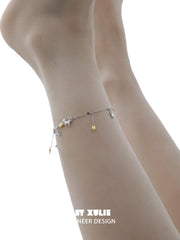 1ST XULIE "Cat's Gaze" Dainty Star Tassel Anklet in 925 Sterling Silver - Product View on Display