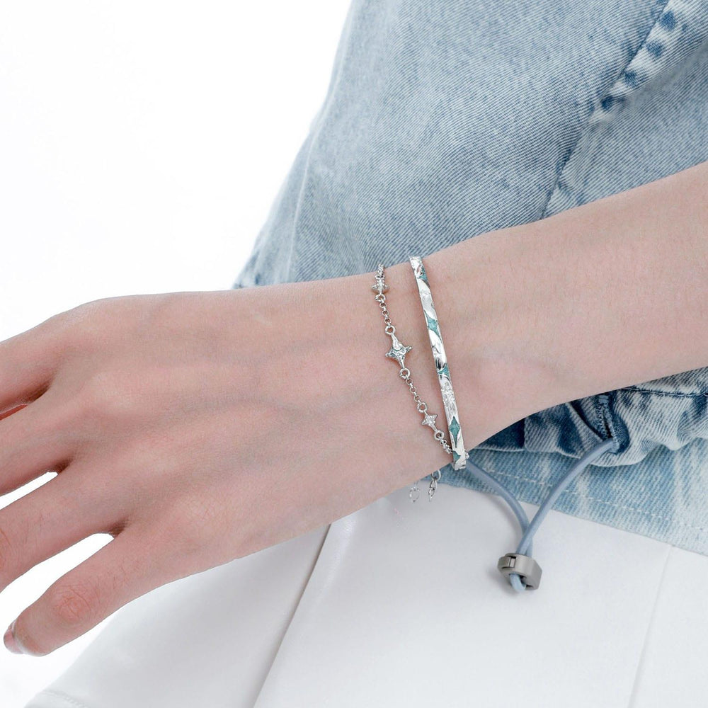 1ST XULIE "Starry Night" Detachable Star & Moon Charm Bracelet in 925 Sterling Silver - Angled View
