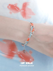 1ST XULIE Jewelry "THE SEA" Dreamy Enamel Goldfish Bangle in Brass - On Model
