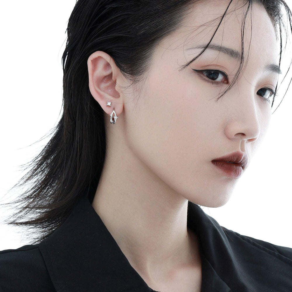 1ST XULIE "Star Trails" Dainty Four-Pointed Star Stud Earrings in 925 Sterling Silver - Angled View
