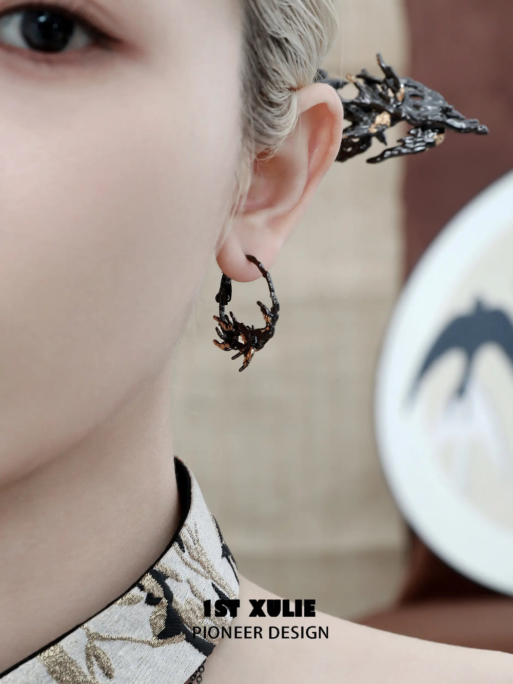 1ST XULIE "Swallow's Return" Gold Leaf Swallow Statement Hoop Earrings in 18K Black Gold Plate - Angled View