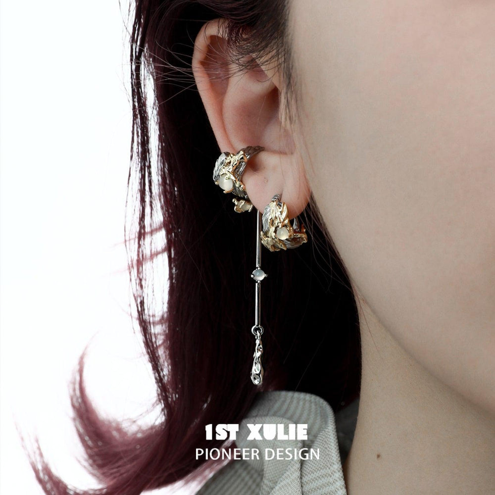 1ST XULIE "Lucifer" Gothic Black Swan Feather Dangle Earrings in 18K Gold & Black Gold Plating - On Model Close-up