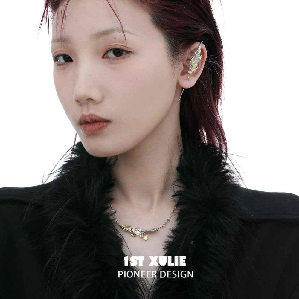 1ST XULIE "Lucifer" Gothic Feather Pendant Necklace in 18K Gold & Platinum Plate - Lifestyle Shot
