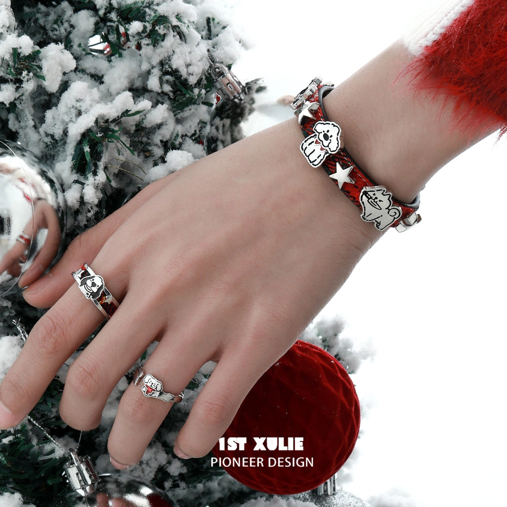 1ST XULIE "MERRY CHRISTMAS 2024" Festive Graffiti Puppy Layered Charm Bracelet in Leather and Brass - Detail Shot