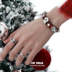 1ST XULIE "MERRY CHRISTMAS 2024" Festive Graffiti Puppy Layered Charm Bracelet in Leather and Brass - Detail Shot
