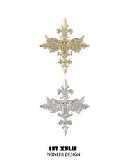 Gold-tone and silver-tone winged Fleur-de-Lis brooches; one random-color brooch is included.