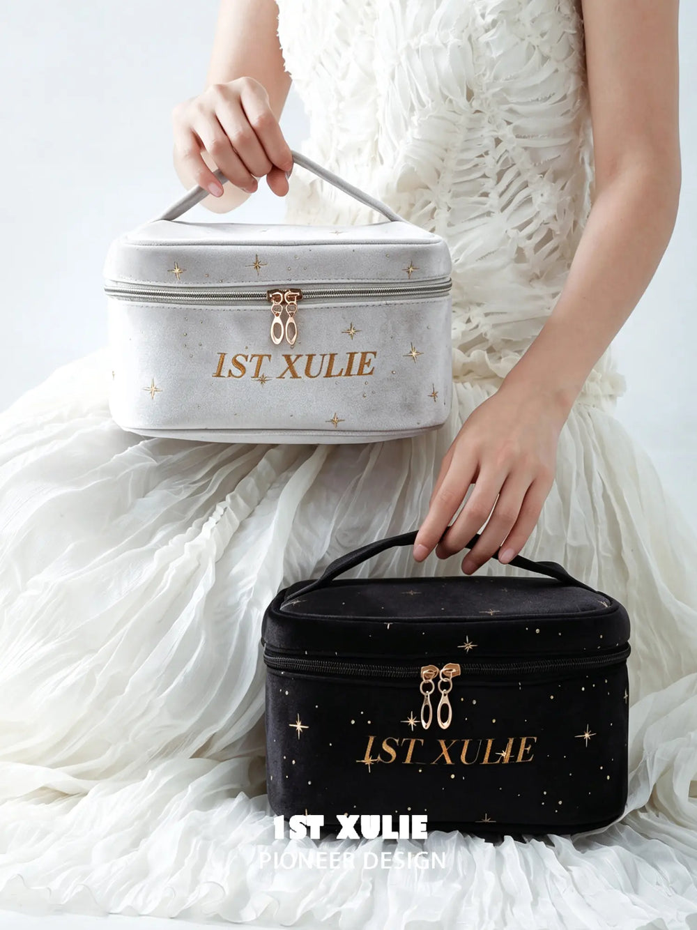 Black and light gray 1ST XULIE velvet makeup bags shown with their carry handles.