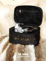 Open black 1ST XULIE makeup bag showing the interior zip pocket; cosmetics are not included.