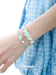 1ST XULIE "Angel Cuties" Hand-Painted Kitten & Puppy Leather Charm Bracelet in 18K Gold Plated Brass - Product View