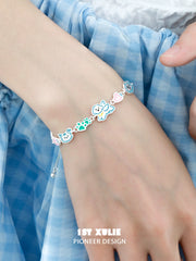 1ST XULIE "Angel Cuties" Hand-Painted Kitten & Puppy Leather Charm Bracelet in 18K Gold Plated Brass - Side View
