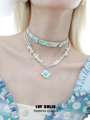 1ST XULIE "Angel Cuties" Kitten & Puppy Hand-Painted Necklace in Platinum Plated & Resin - Lifestyle Shot