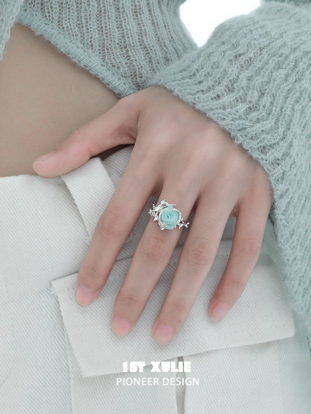 1ST XULIE "Taboo Rose" Knitted Rose Adjustable Open Ring in 925 Sterling Silver - Angled View