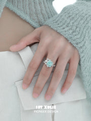 1ST XULIE "Taboo Rose" Knitted Rose Adjustable Open Ring in 925 Sterling Silver - Angled View