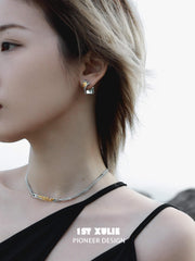 1ST XULIE "Immortal Lover" Dainty Twisted Love Letter Stud Earrings in 925 Sterling Silver - Lifestyle Shot