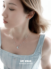 1ST XULIE "Melting Crescent" Dainty Moon Stud Earrings in 925 Sterling Silver - On Model Close-up