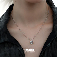 1ST XULIE "Snake Bite" Minimalist Energy Crystal Pendant Necklace in 925 Sterling Silver - On Model Close-up
