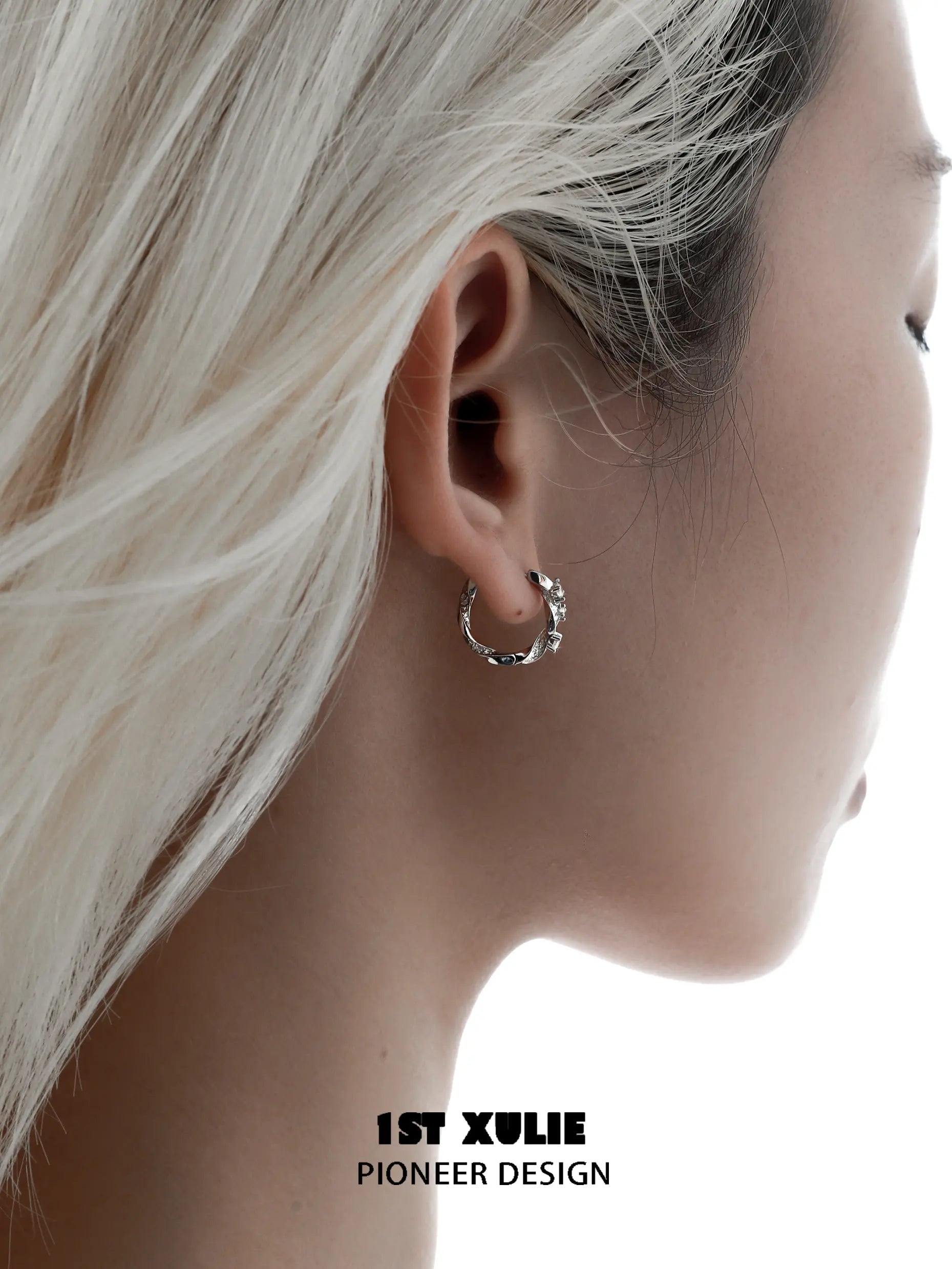 1ST XULIE "Star Trails" Möbius Twist Pavé Huggie Earrings in 925 Sterling Silver - Main Product View 1ST XULIE "Star Trails" Möbius Twist Pavé Huggie Earrings in 925 Sterling Silver - Main Product View