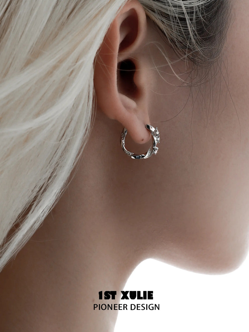 1ST XULIE "Star Trails" Möbius Twist Pavé Huggie Earrings in 925 Sterling Silver - Detail Shot
