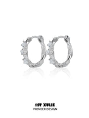 1ST XULIE "Star Trails" Möbius Twist Pavé Huggie Earrings in 925 Sterling Silver - On Model Close-Up
