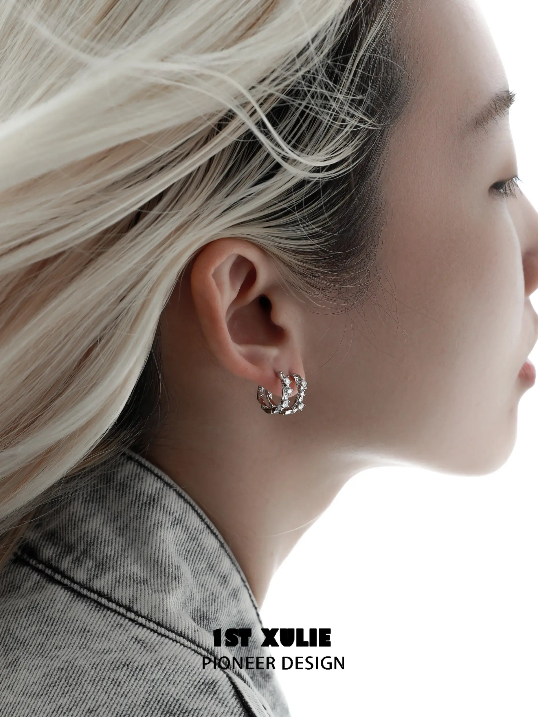 1ST XULIE "Star Trails" Möbius Twist Pavé Huggie Earrings in 925 Sterling Silver - Packaging View 1ST XULIE "Star Trails" Möbius Twist Pavé Huggie Earrings in 925 Sterling Silver - Packaging View