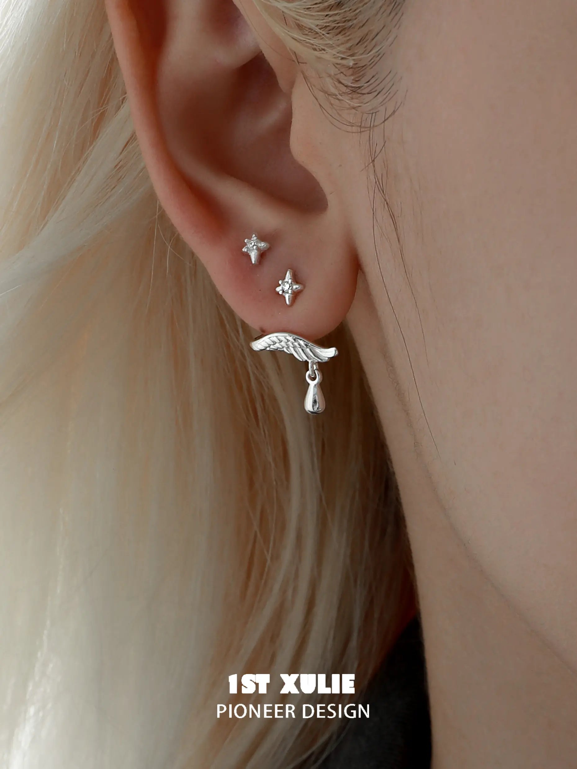 1ST XULIE "Lucifer" Dainty Newborn Plume Feather Stud Earrings in 925 Sterling Silver - On Model 1ST XULIE "Lucifer" Dainty Newborn Plume Feather Stud Earrings in 925 Sterling Silver - On Model
