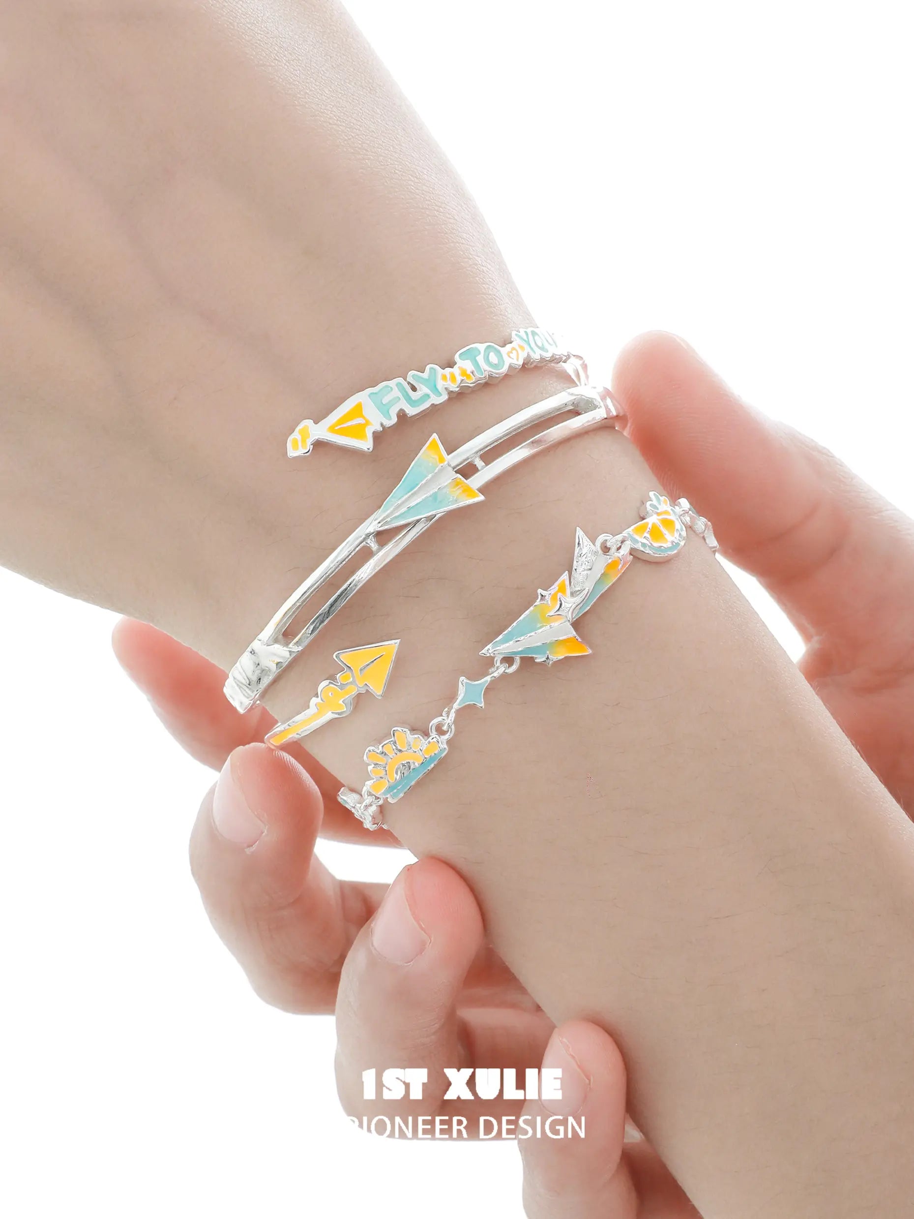 1ST XULIE Jewelry "Juicy Flight" Dainty Paper Airplane Enamel Charm Bracelet in Platinum Plated - On Model 1ST XULIE Jewelry "Juicy Flight" Dainty Paper Airplane Enamel Charm Bracelet in Platinum Plated - On Model