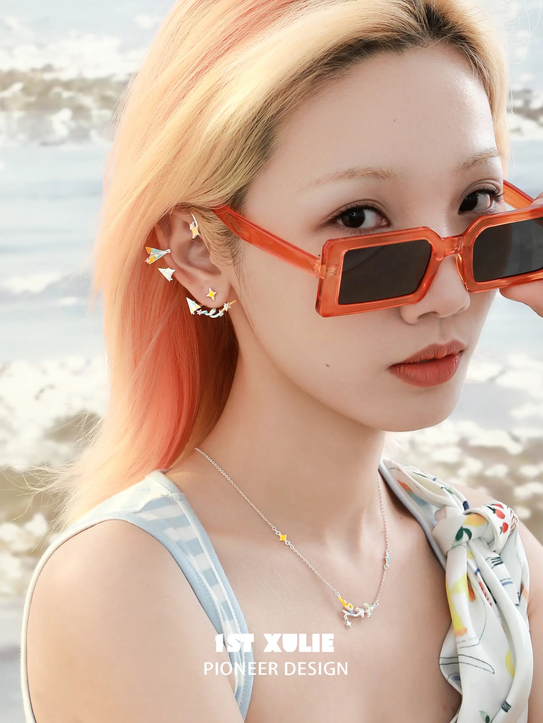 1ST XULIE "Juicy Flight" Asymmetrical Paper Airplane & Star Statement Stud Earrings in Platinum Plated - Lifestyle Shot 1ST XULIE "Juicy Flight" Asymmetrical Paper Airplane & Star Statement Stud Earrings in Platinum Plated - Lifestyle Shot