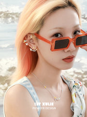 1ST XULIE "Juicy Flight" Asymmetrical Paper Airplane & Star Statement Stud Earrings in Platinum Plated - Lifestyle Shot