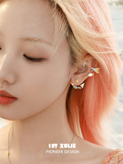 1ST XULIE "Juicy Flight" Asymmetrical Paper Airplane & Star Statement Stud Earrings with Enamel Accents - On Model