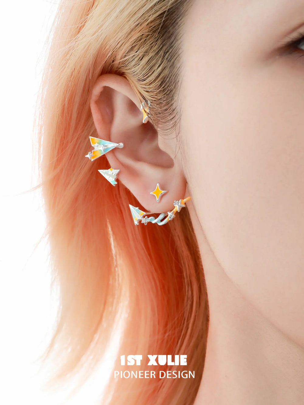 1ST XULIE "Juicy Flight" Asymmetrical Paper Airplane & Star Statement Stud Earrings in Platinum Plated - On Model Close-Up