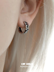 1ST XULIE "Snake Bite" Pave Serpent Huggie Hoop Earrings in Platinum Plated Brass - On Model Close-Up